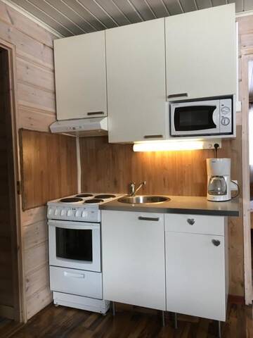 Фото номера Коттедж с 2 спальнями и сауной Дома для отпуска Kultala Cottage г. Коркеакоски 14